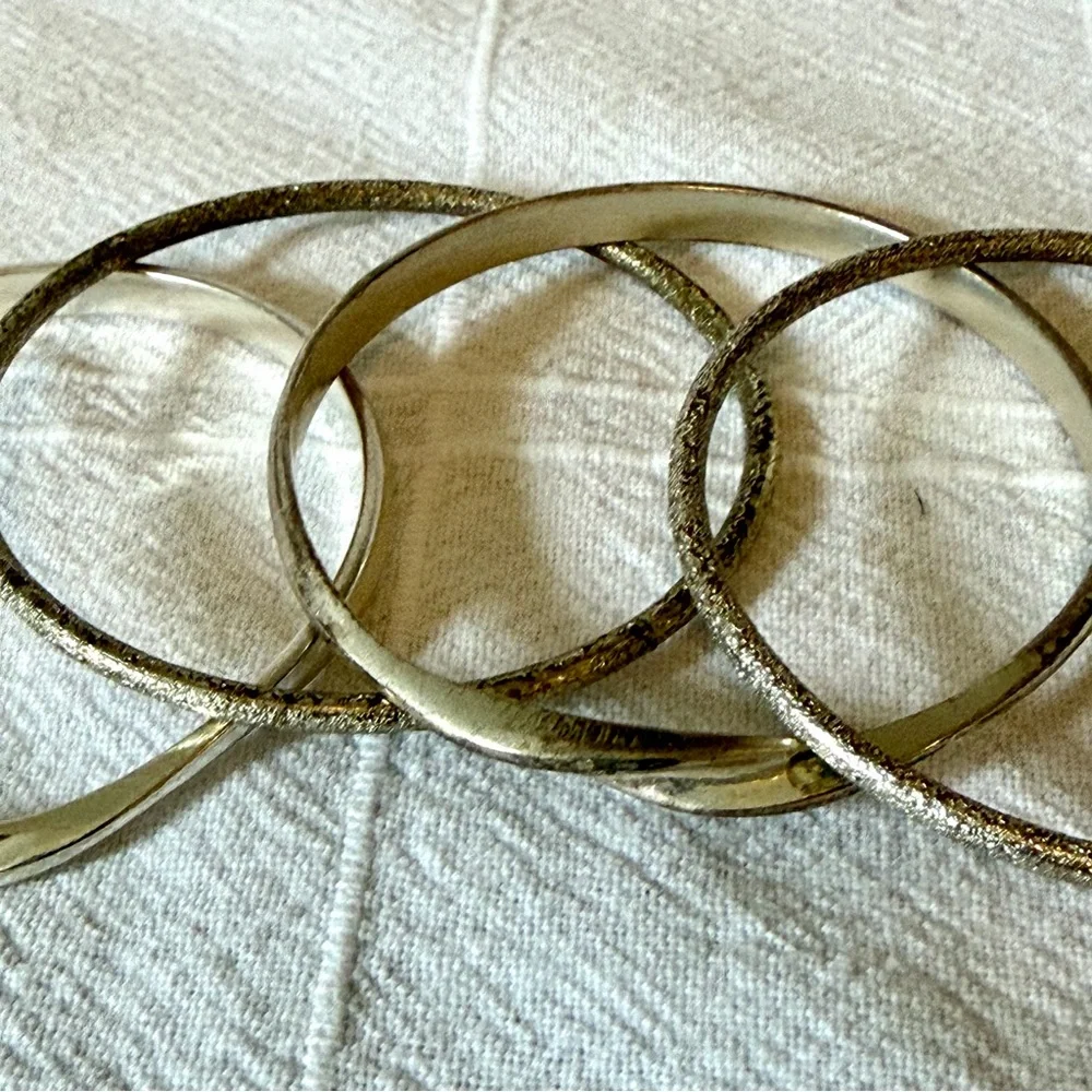 Set of 4 Silver Tone Bangle Bracelets to stack/layer